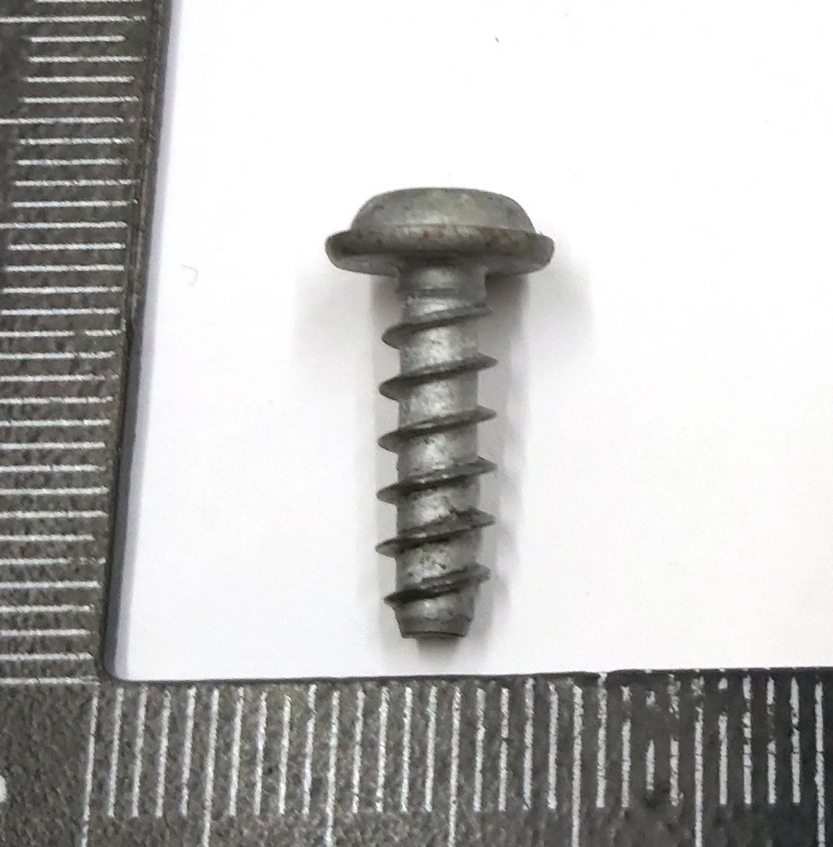 7 Гвинт кріплення кронштейна головної фари Tesla Model 3, Model Y 1453379-00-A