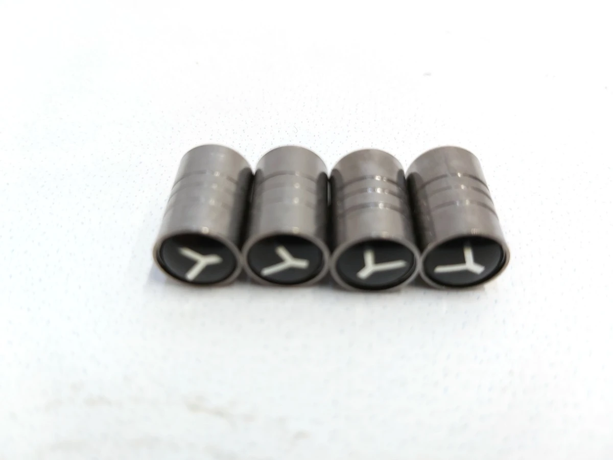 4 Set of caps (4 pieces) TPMS sensor 3D "Y" SILVER Tesla Model Y, Model Y Feb 2025 1034602 1074812 1490750