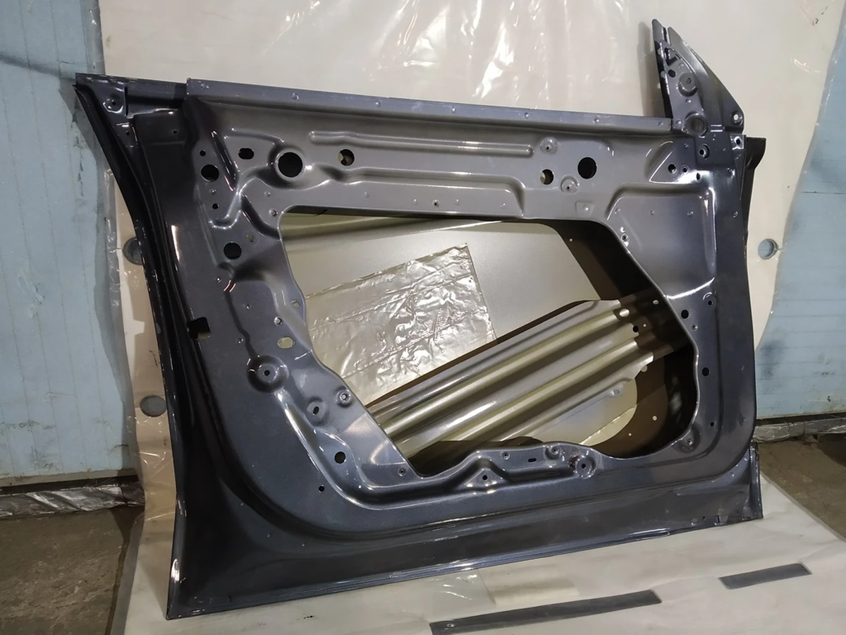 4 Двері передні ліві PMNG з пошкодженням Tesla mode Y 1493549-S0-A