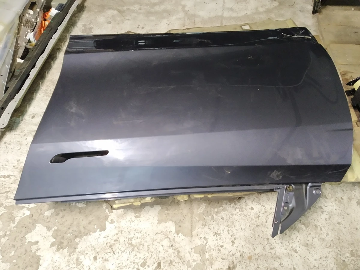 4 Двері передні ліві PMNG з пошкодженням Tesla mode Y 1493549-S0-A