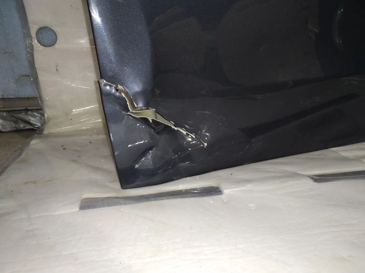 4 Двері передні ліві PMNG з пошкодженням Tesla mode Y 1493549-S0-A