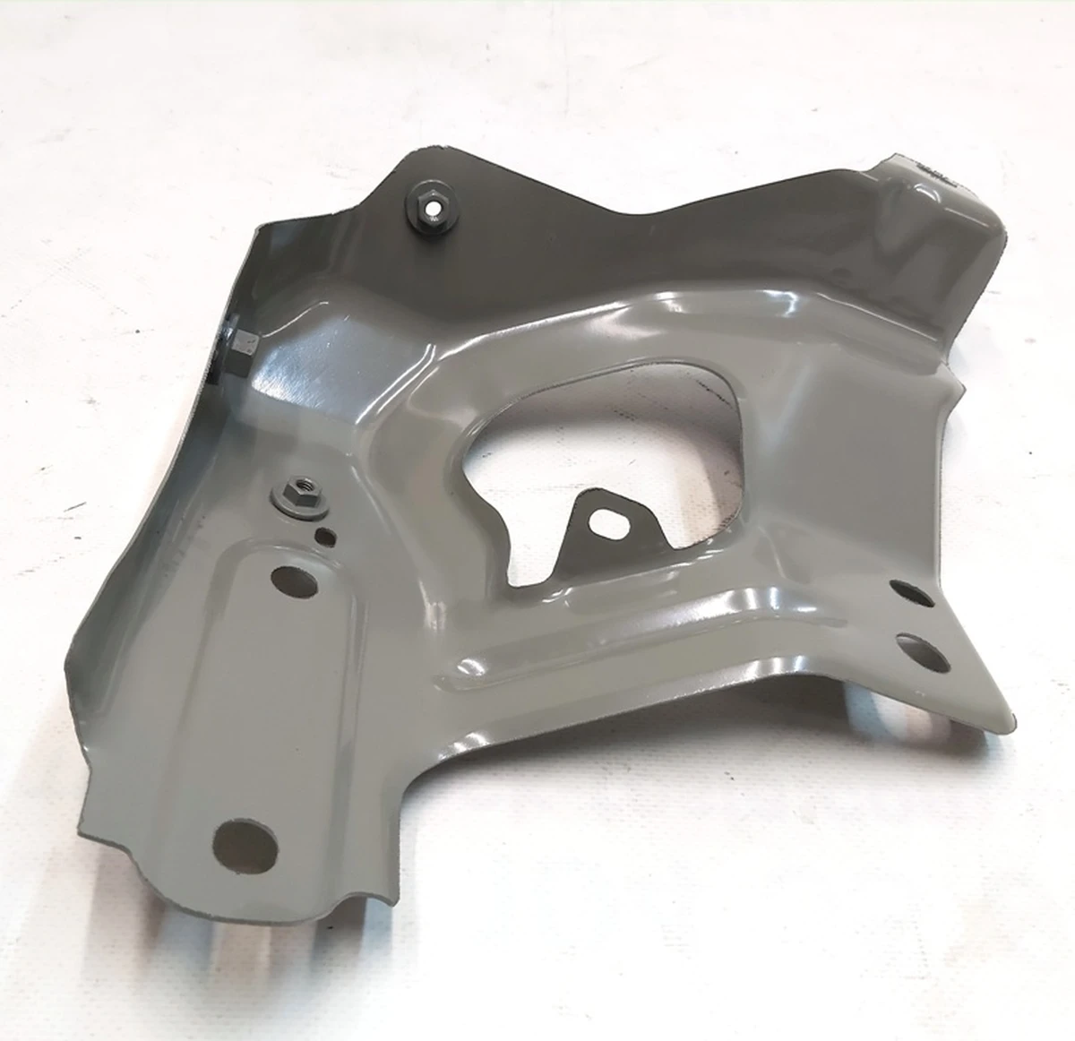 25 ASY - FEM BRKT LH Tesla model Y 1487491-00-A 1504589-S0-A