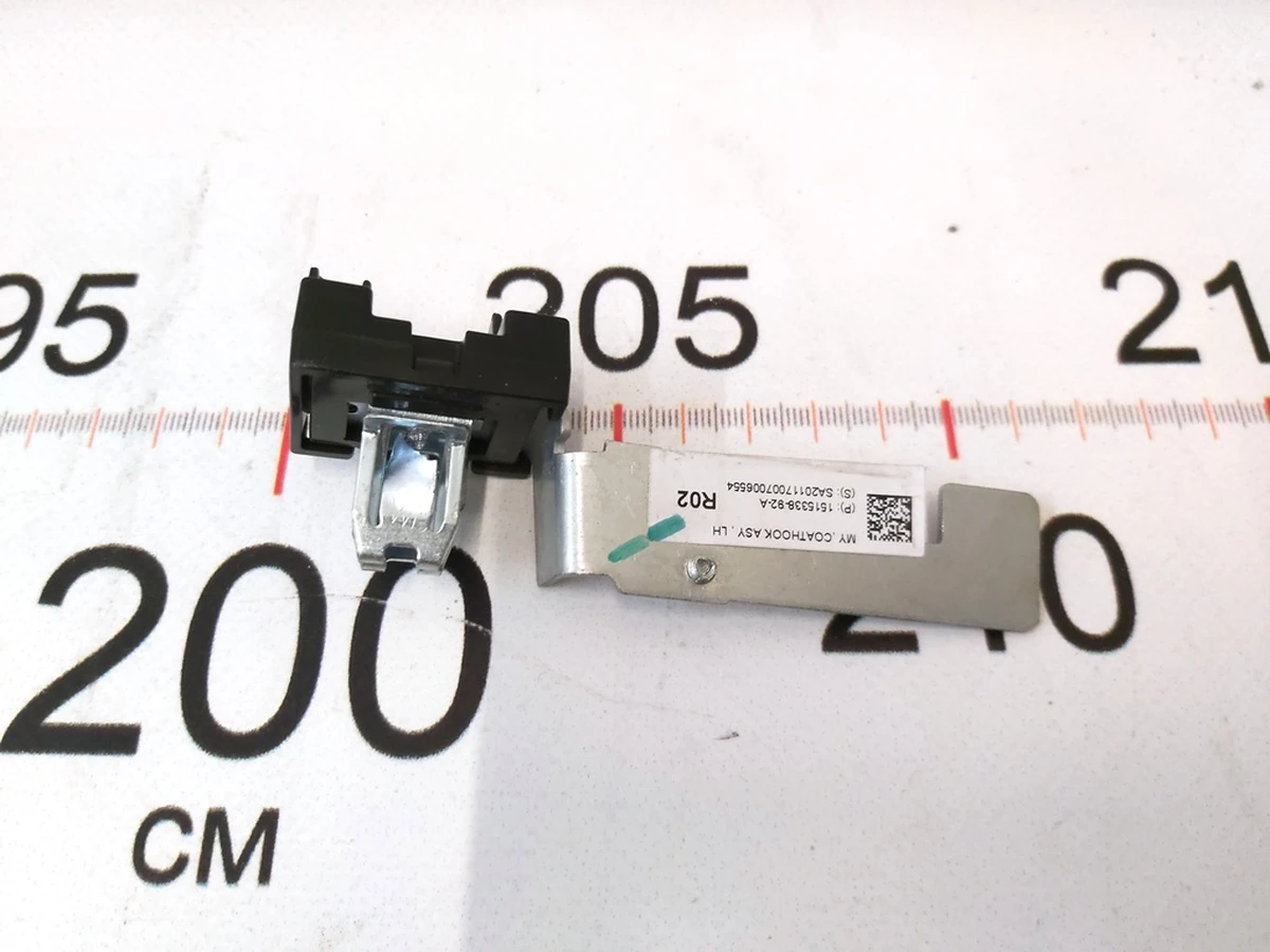 10 Кронштейн гачка гардеробного з підсвічуванням лівий R02 Tesla Model Y 1515338-92-A