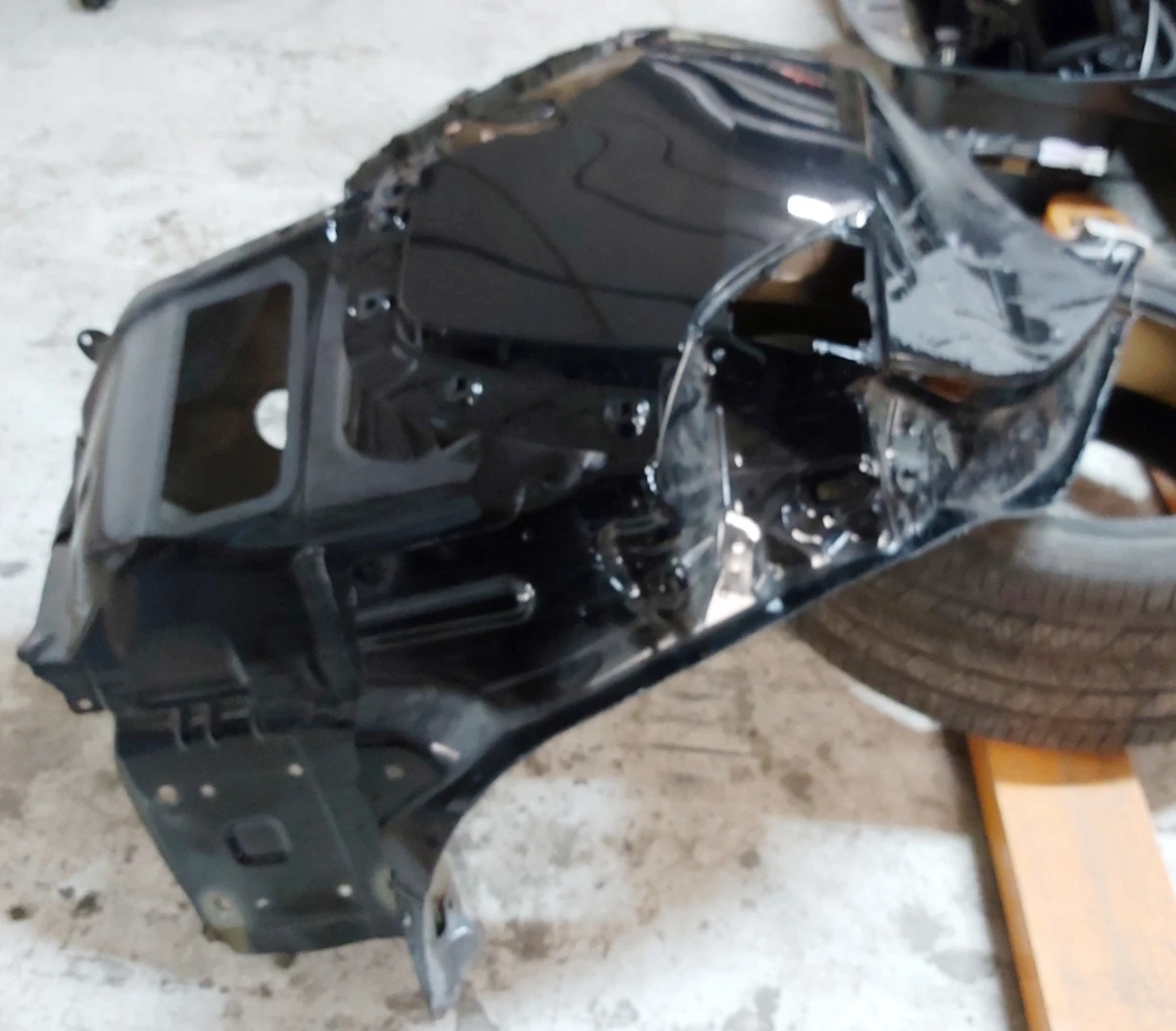 3 Quarter rear left fender with body fragments PBSB Tesla model Y 1549230-S0-A