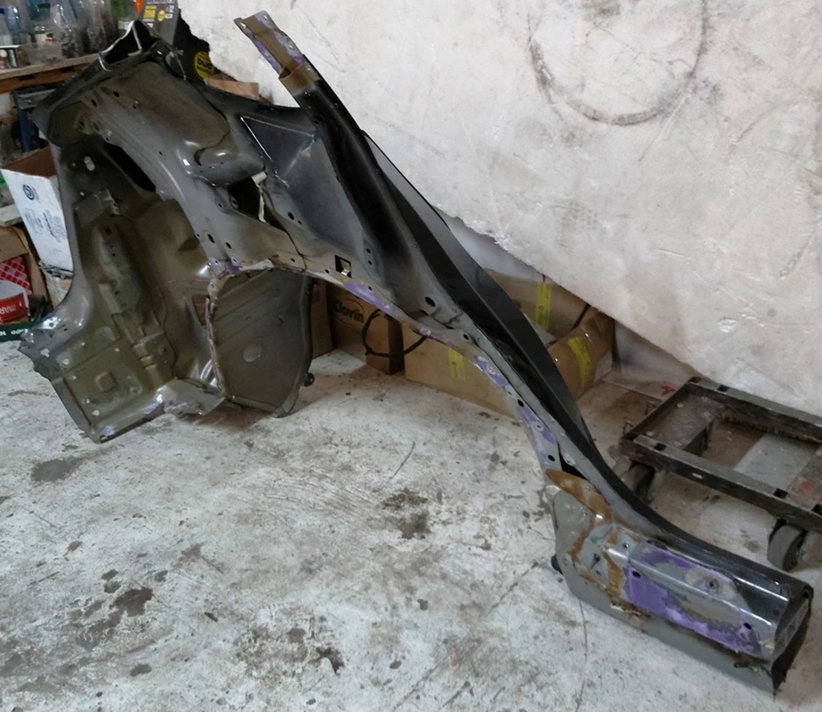 3 Quarter rear left fender with body fragments PBSB Tesla model Y 1549230-S0-A