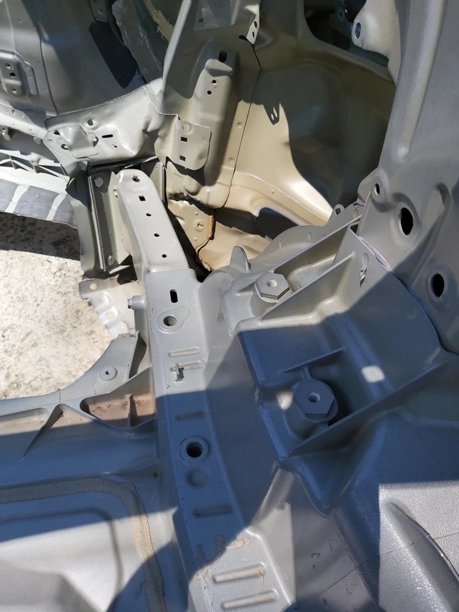 3 Quarter rear left PMNG with damage to wing and spar Tesla model Y 1549230-S0-A