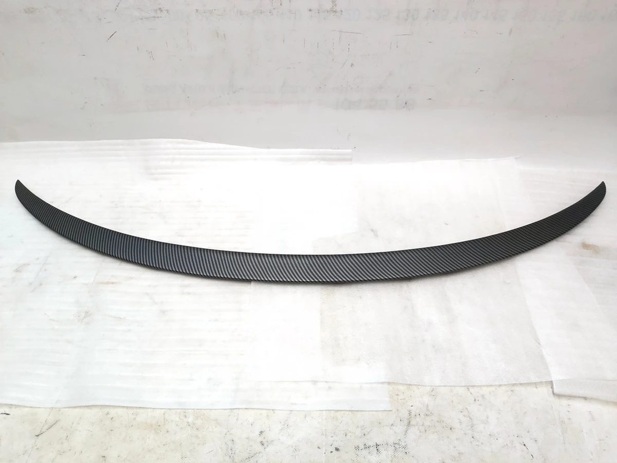 11 Спойлер декоративный крышки багажника (ляды) MATTE CARBON Tesla model 3 1081460-E0-D