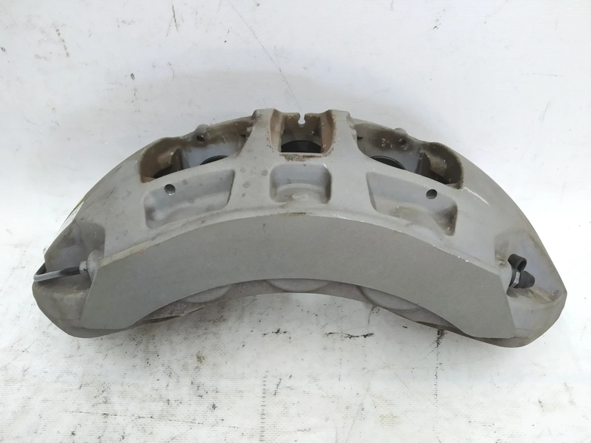 Суппорт тормозной неподвижный передний правый без тормозных колодок Audi E-tron 4KE615108B