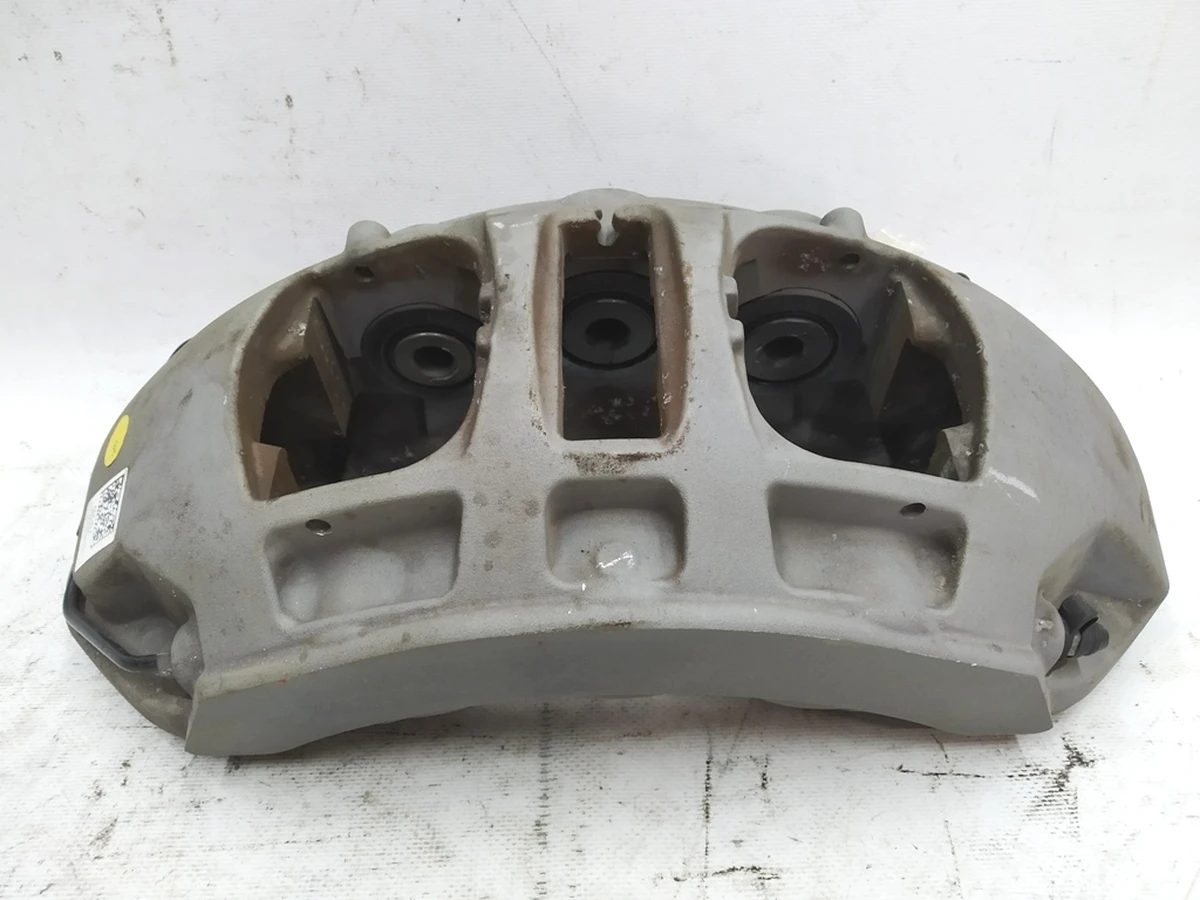 Суппорт тормозной неподвижный передний правый без тормозных колодок Audi E-tron 4KE615108B