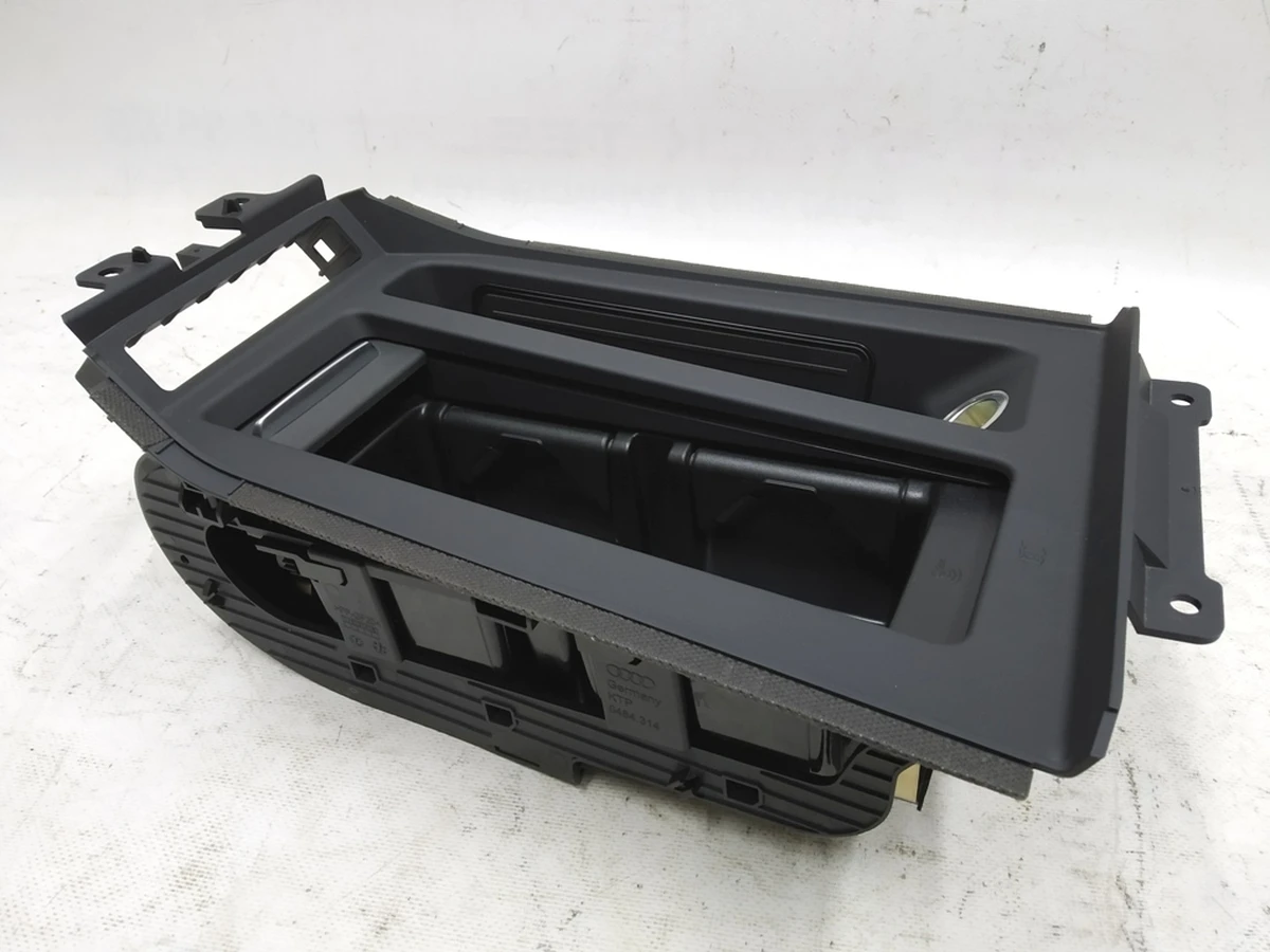 Center console cup holder with socket and induction charging assembly Audi E-tron 4KE862533E