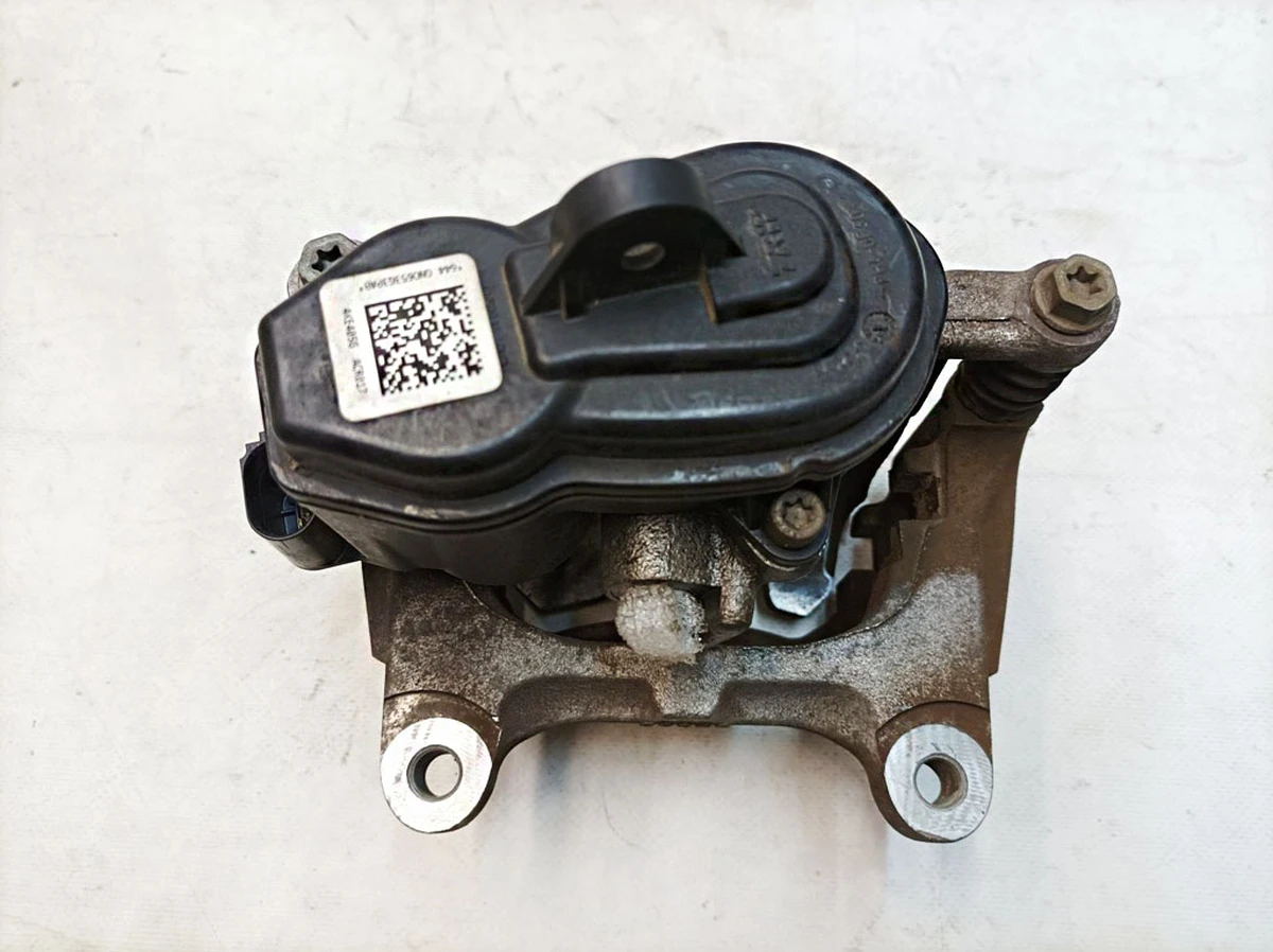 Суппорт тормозной задний левый без колодок в сборе Audi E-tron 4M0615403A