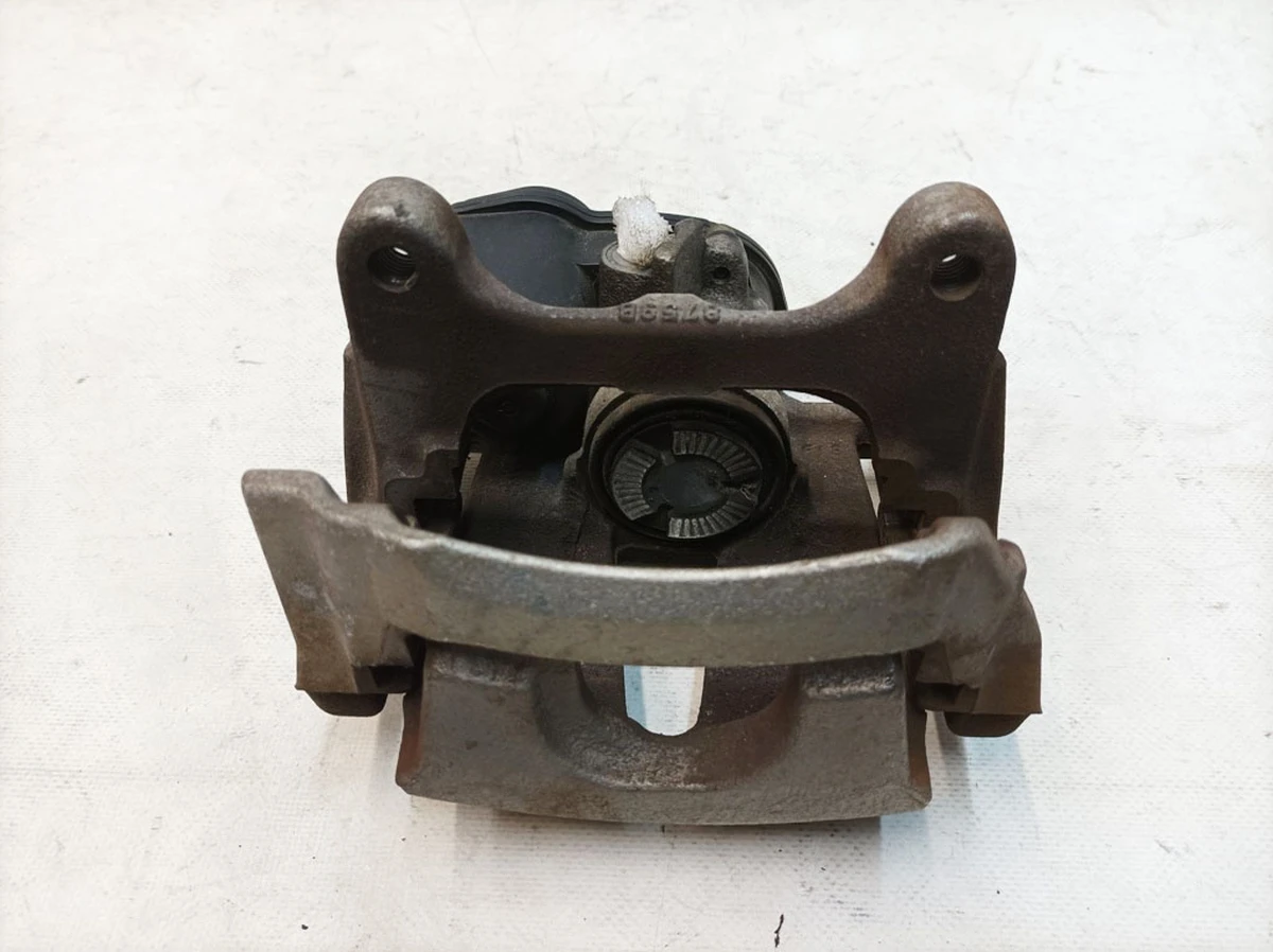 Суппорт тормозной задний левый без колодок в сборе Audi E-tron 4M0615403A