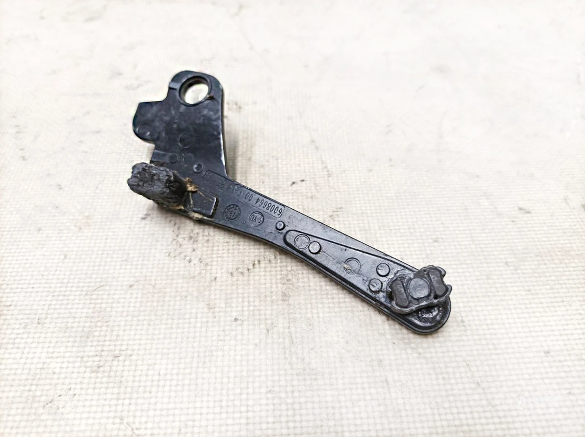 9 Hatch guide bracket front left REV01 with damage Tesla model S 6008664-00-F