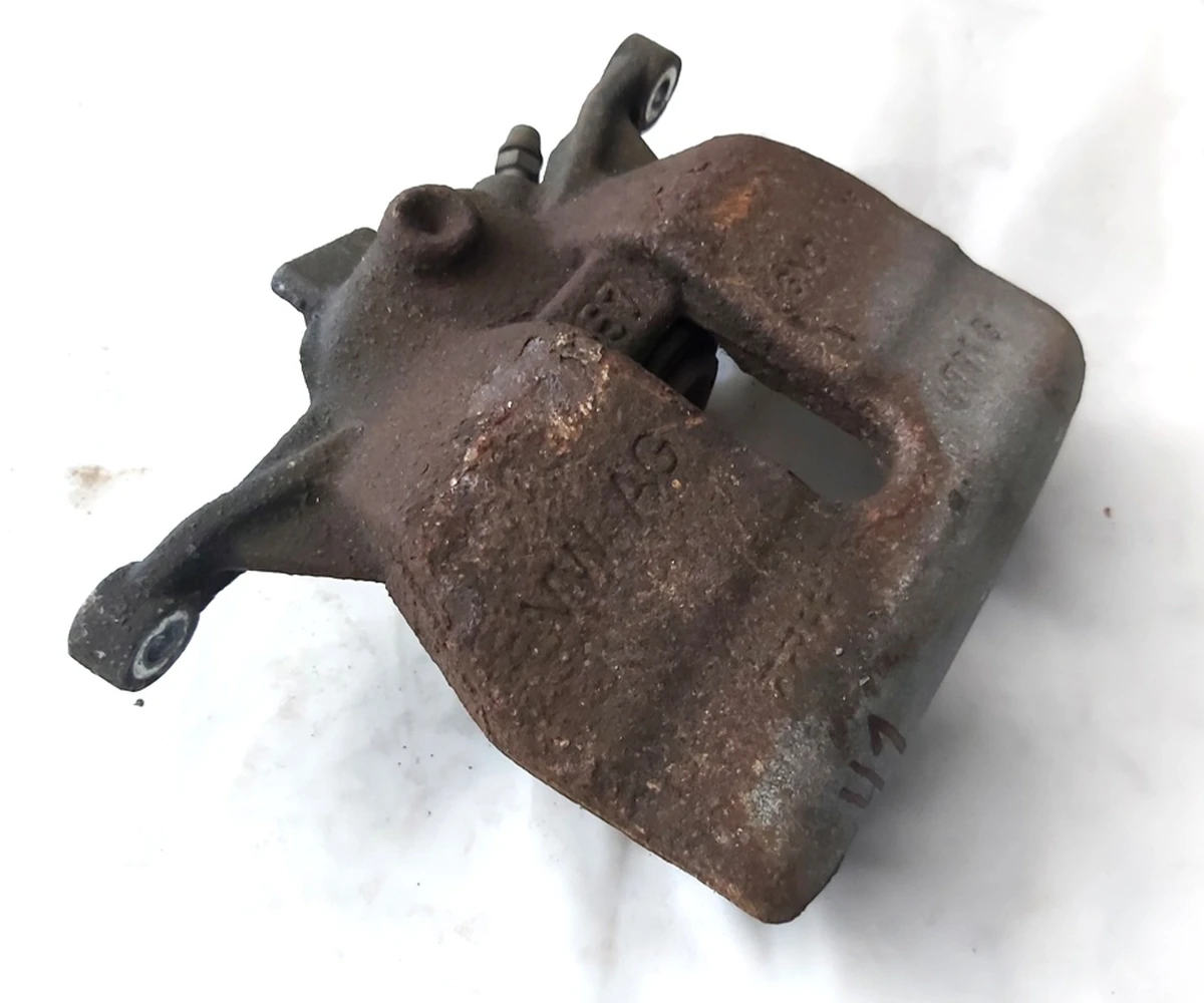 Корпус супорта гальмівного передній лівий Volkswagen E-GOLF 8V0615123