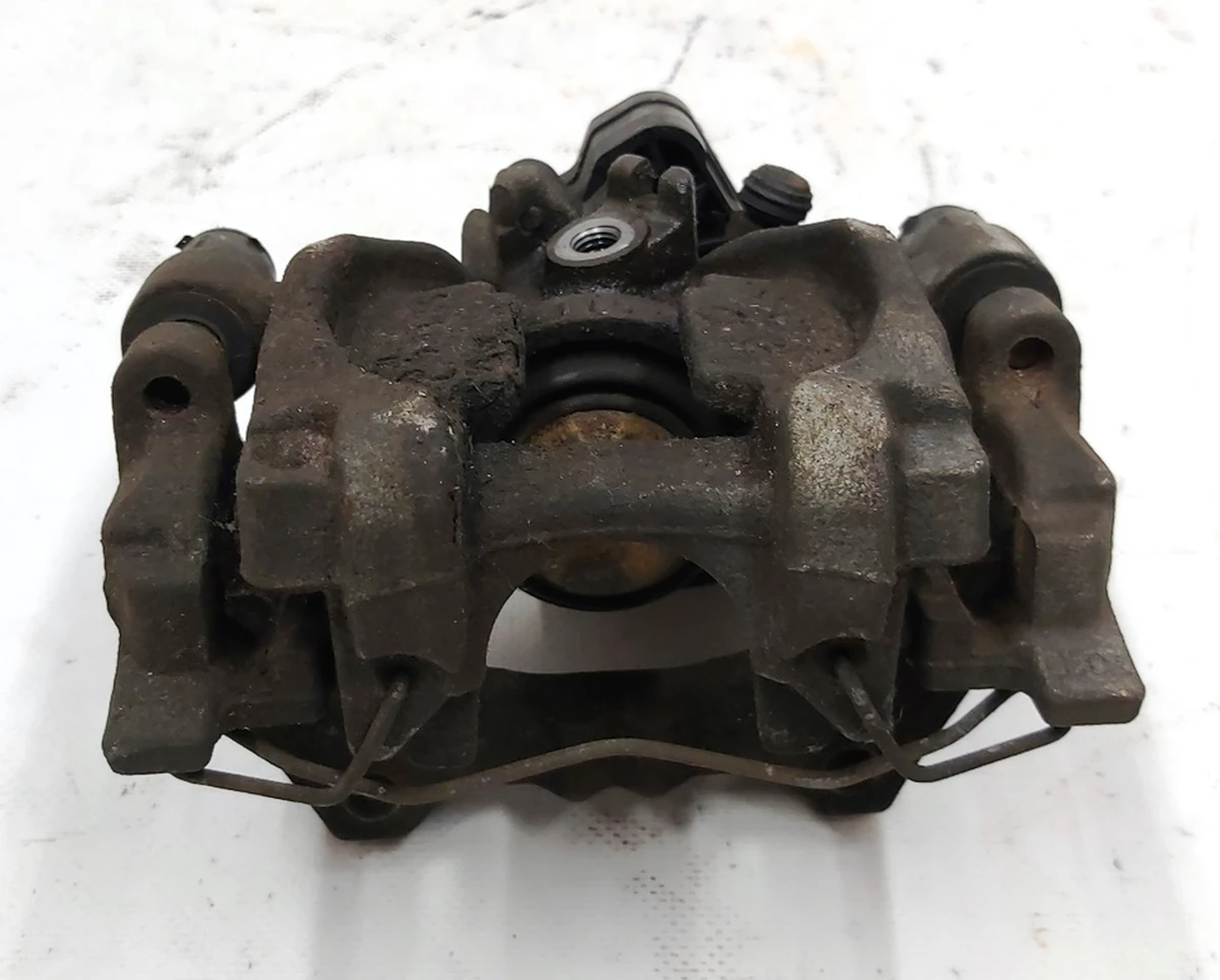 Супорт гальмівний задній лівий Volkswagen E-GOLF 8V0615423