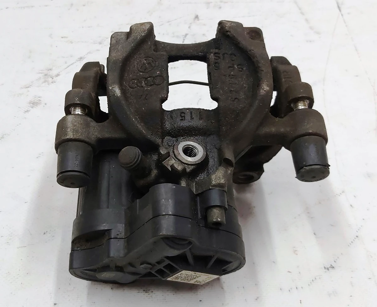 Супорт гальмівний задній лівий Volkswagen E-GOLF 8V0615423