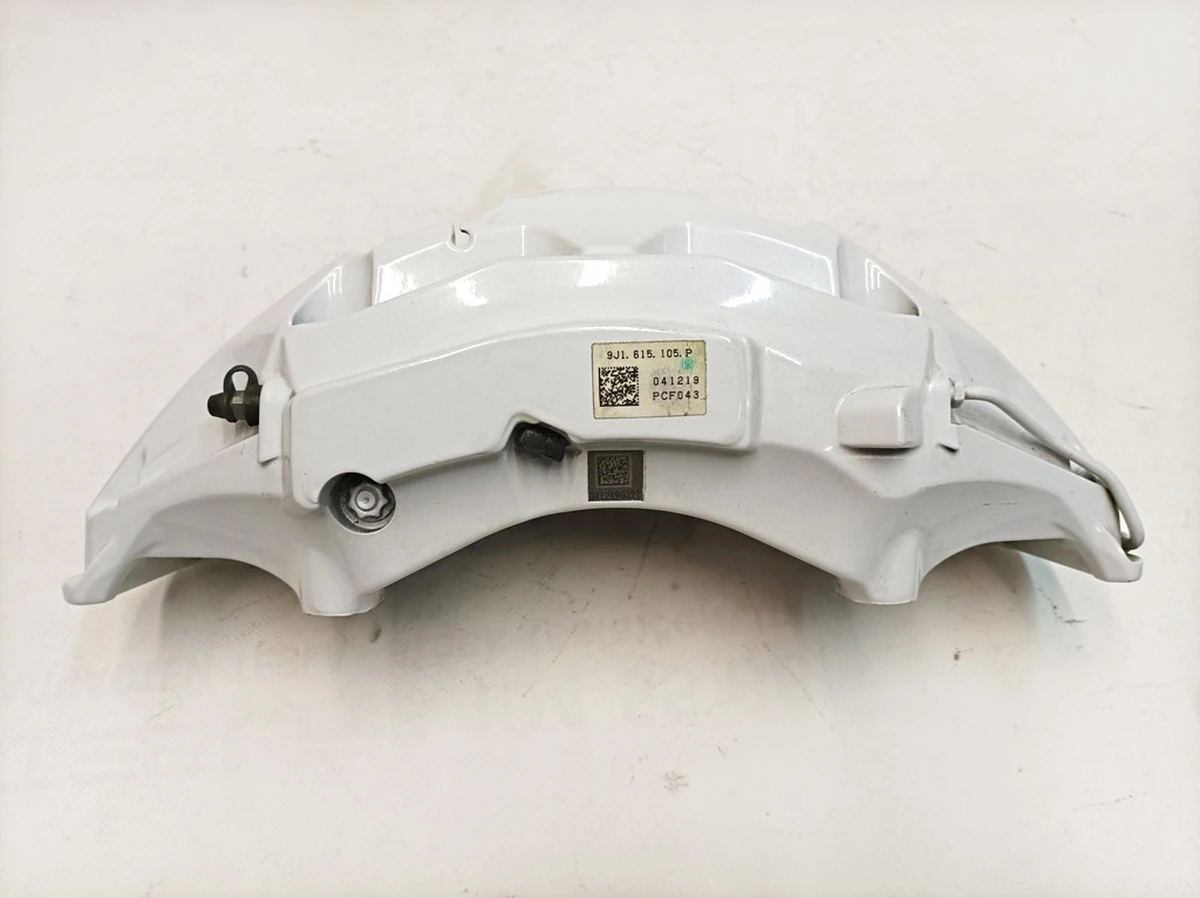 Суппорт неподвижный передний левый без тормозных колодок AKEBONO (Белый 19) Porsche Taycan 9J1615105P