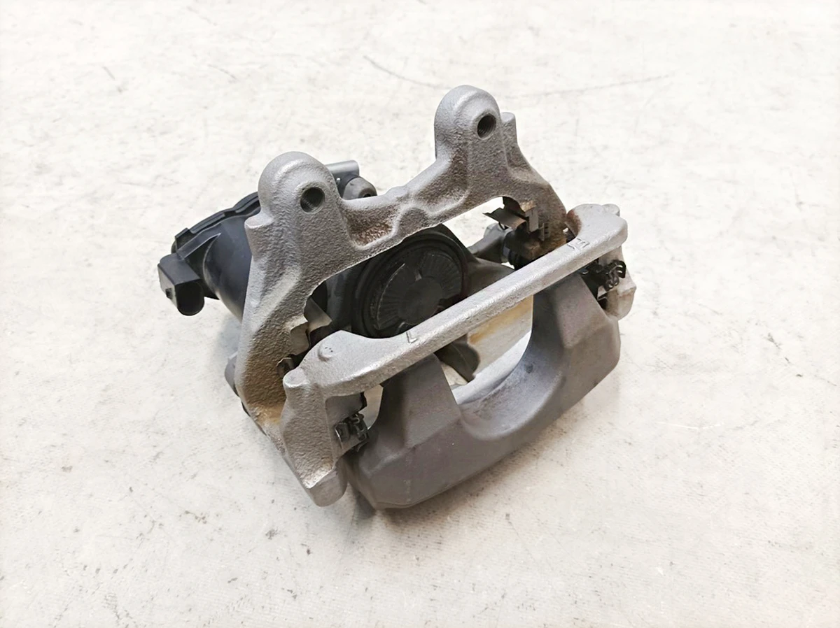 Супорт гальмівний задній лівий в зборі (без колодок) Mercedes EQS A2974235900